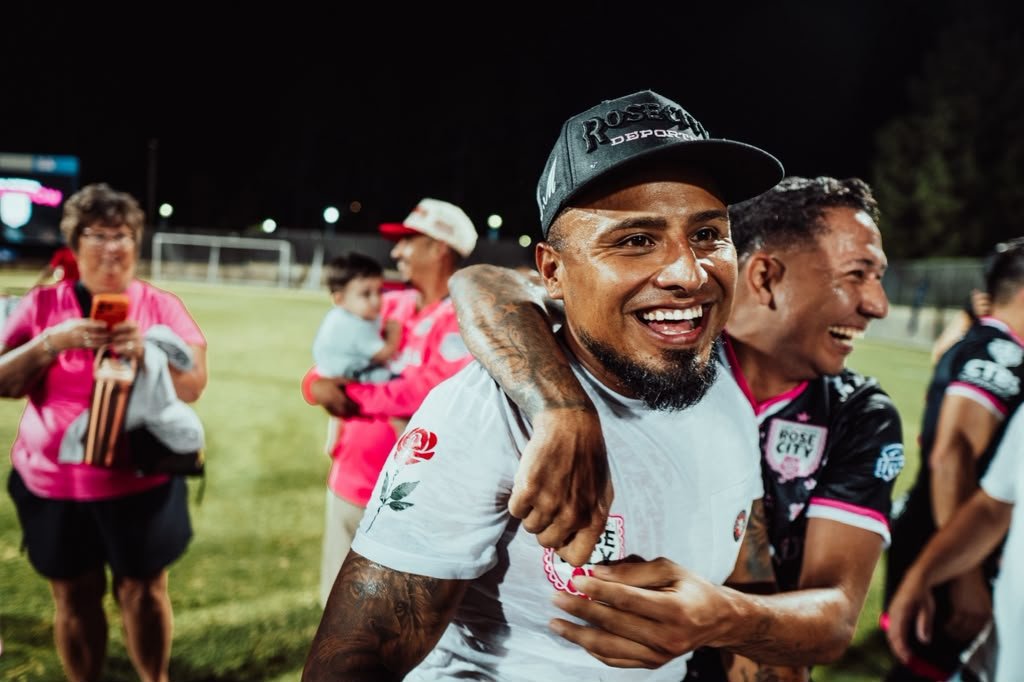 The Coach, Embraced By His Champions